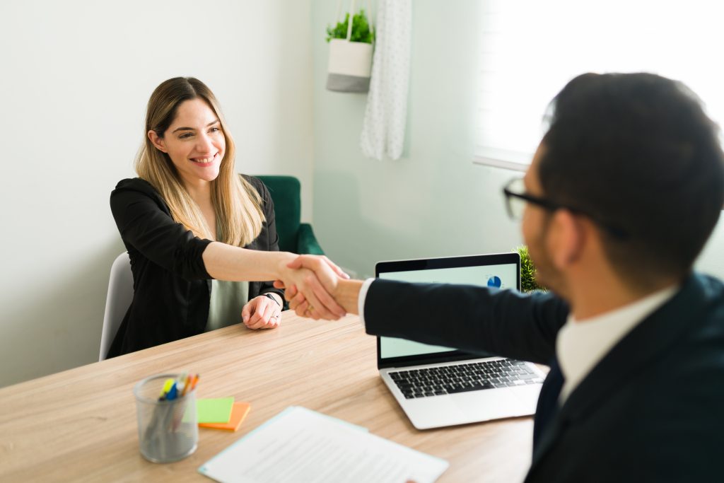 happy-caucasian-woman-shaking-hands-with-latin-man-business-meeting-with-lawyer-manager-hiring-beautiful-professional-woman-new-job-1024x683